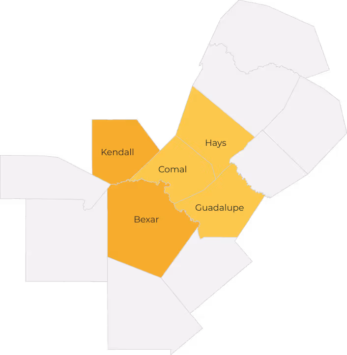 Map highlighting Kendall, Bexar, Comal, Hays, and Guadalupe counties in Greater Austin area in shades of orange and yellow.